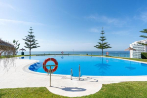 Duplex de lujo en la playa , jacuzzy, piscina, chimenea y padel